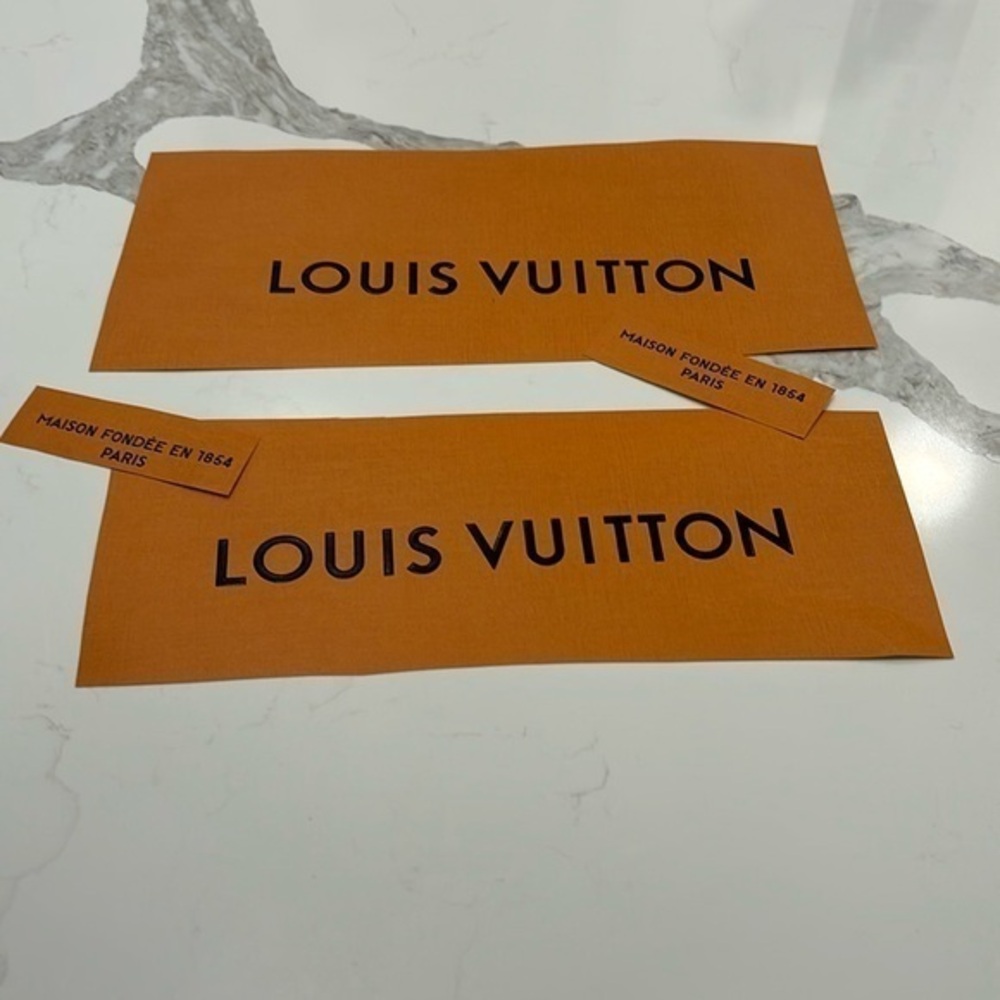 Louis Vuitton pieces of paper bags. 4 pieces total